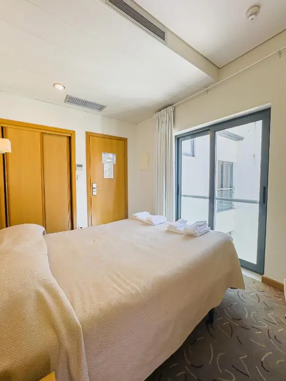 Quarto Duplo